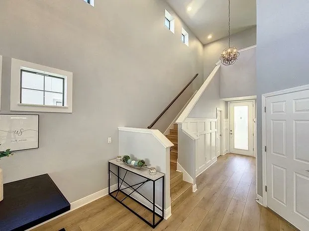 Hardwood foyer and staircase open plan Holiday FL