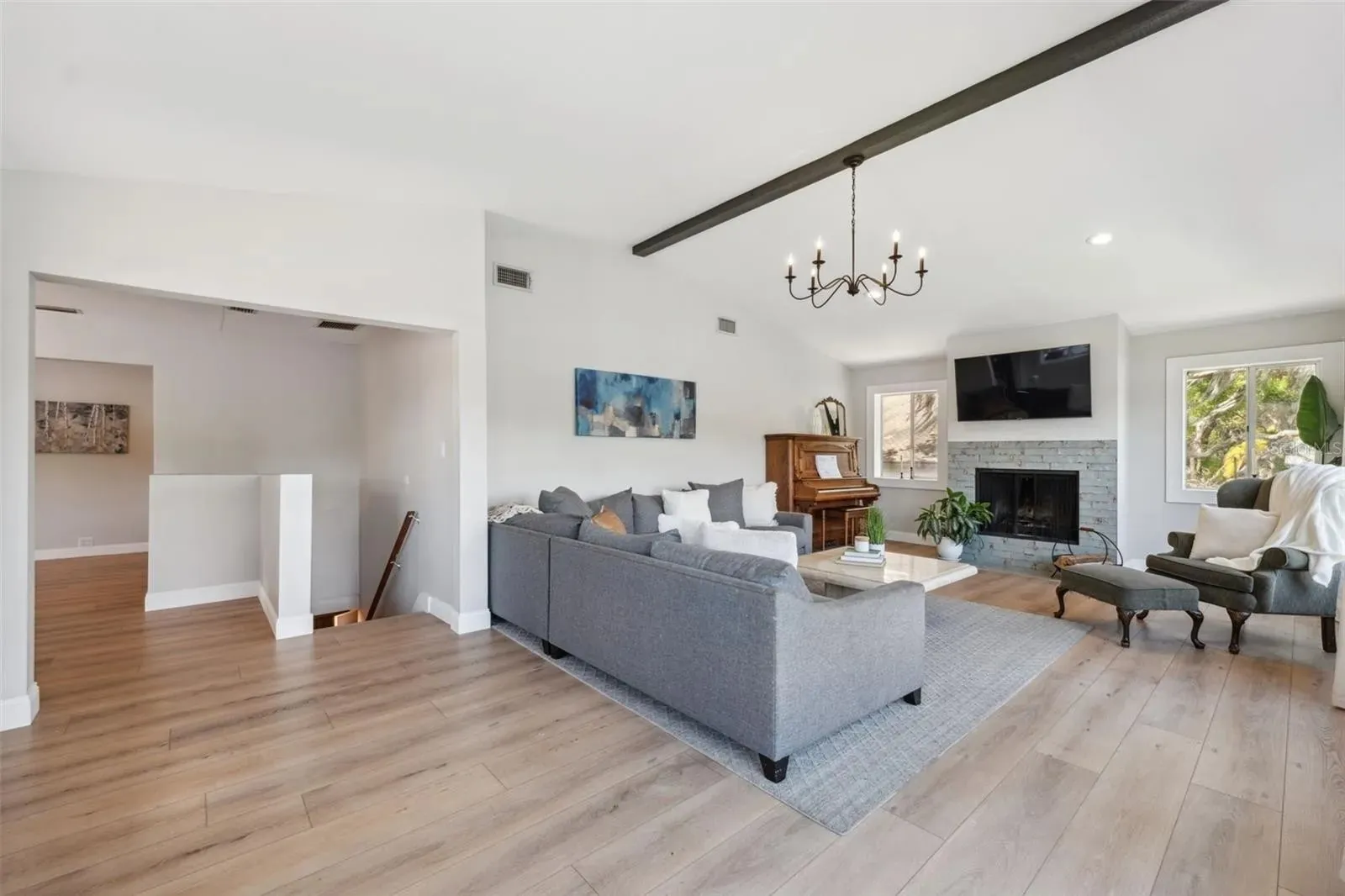 LVP lakefront living room bright Holiday FL