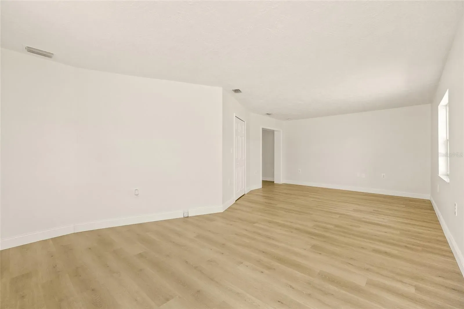 LVP spacious master bedroom Holiday FL