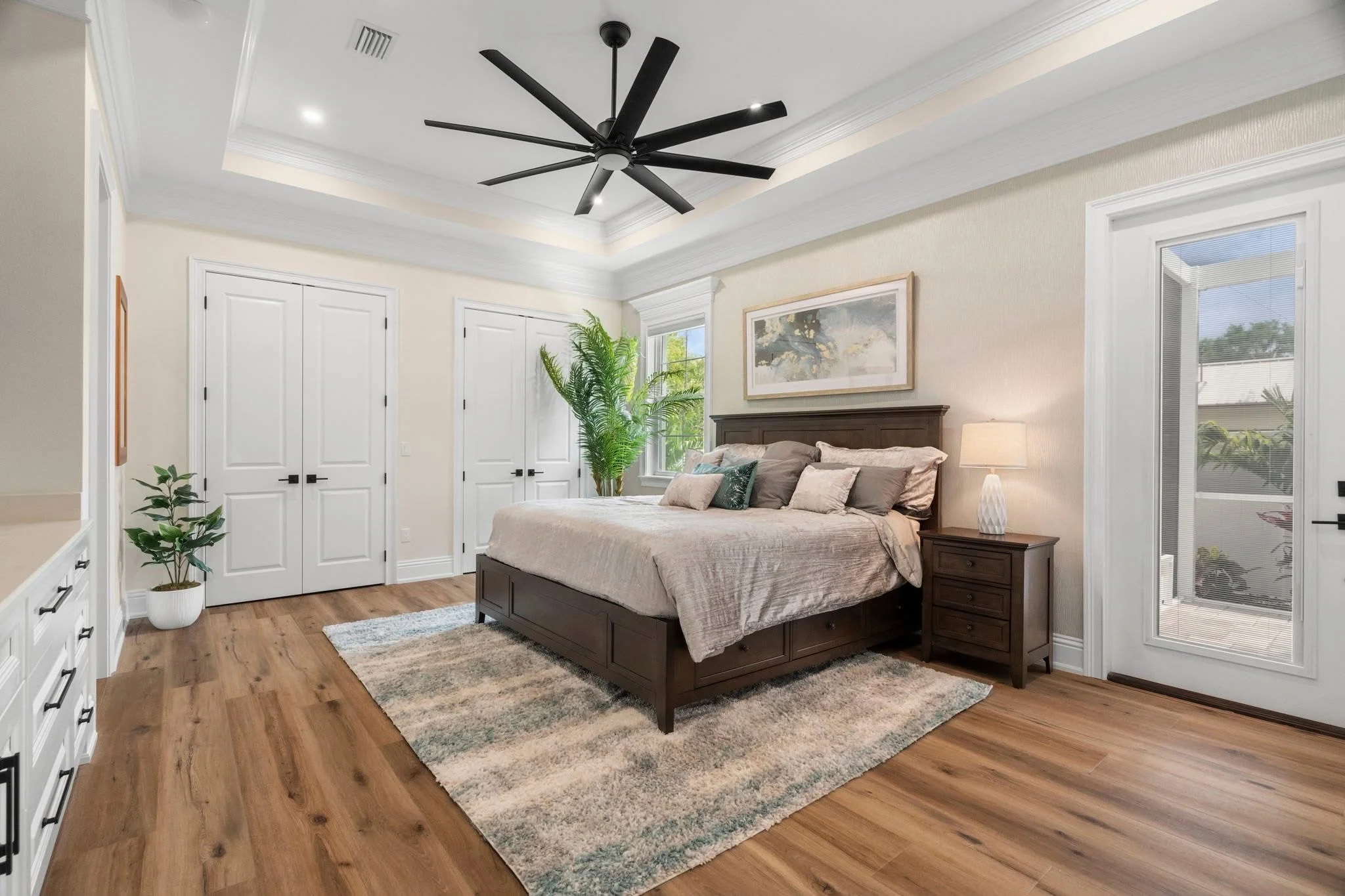 LVP master bedroom with tray ceiling — Holiday, FL