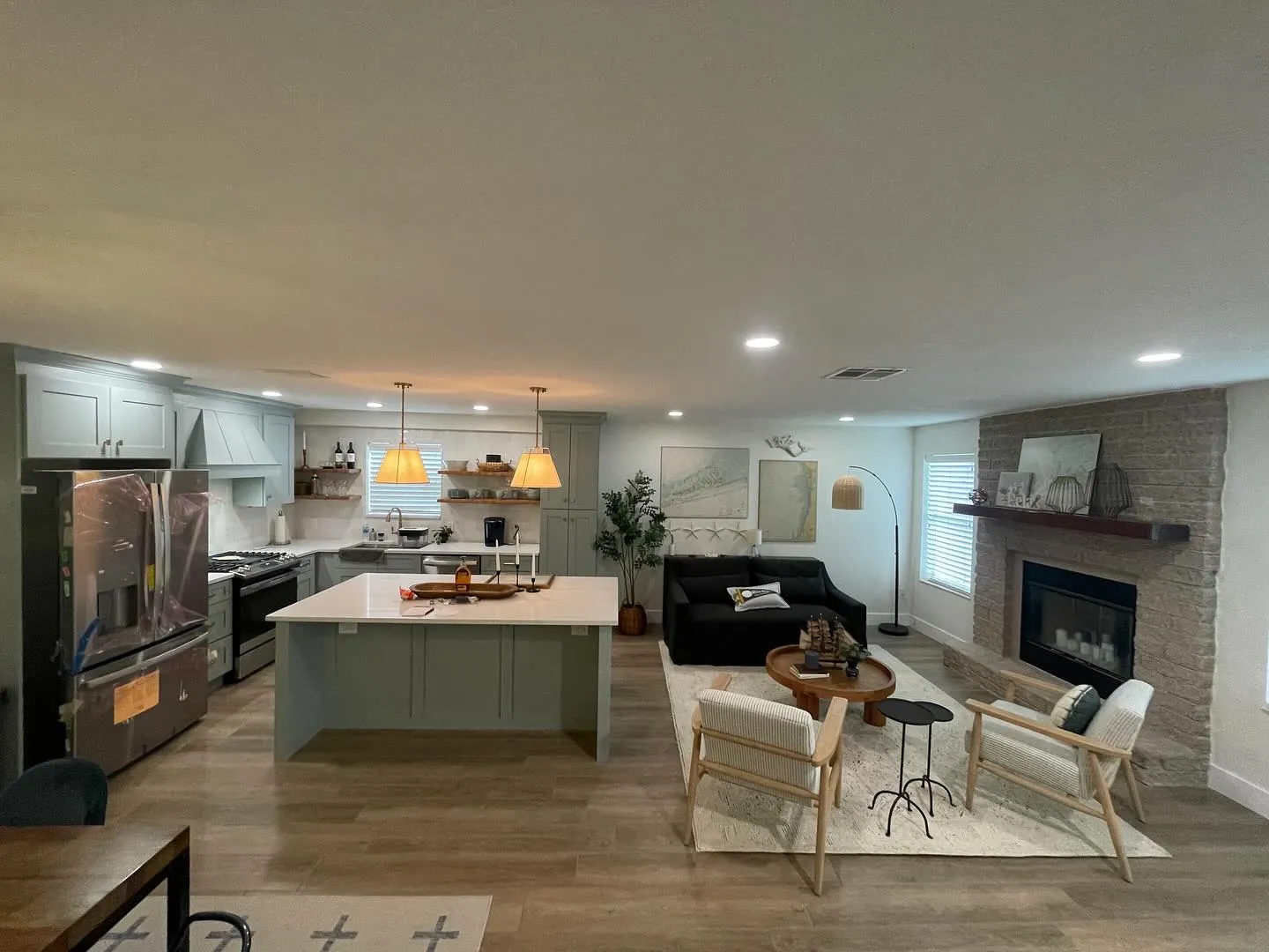 LVP open plan kitchen fireplace coastal Holiday FL