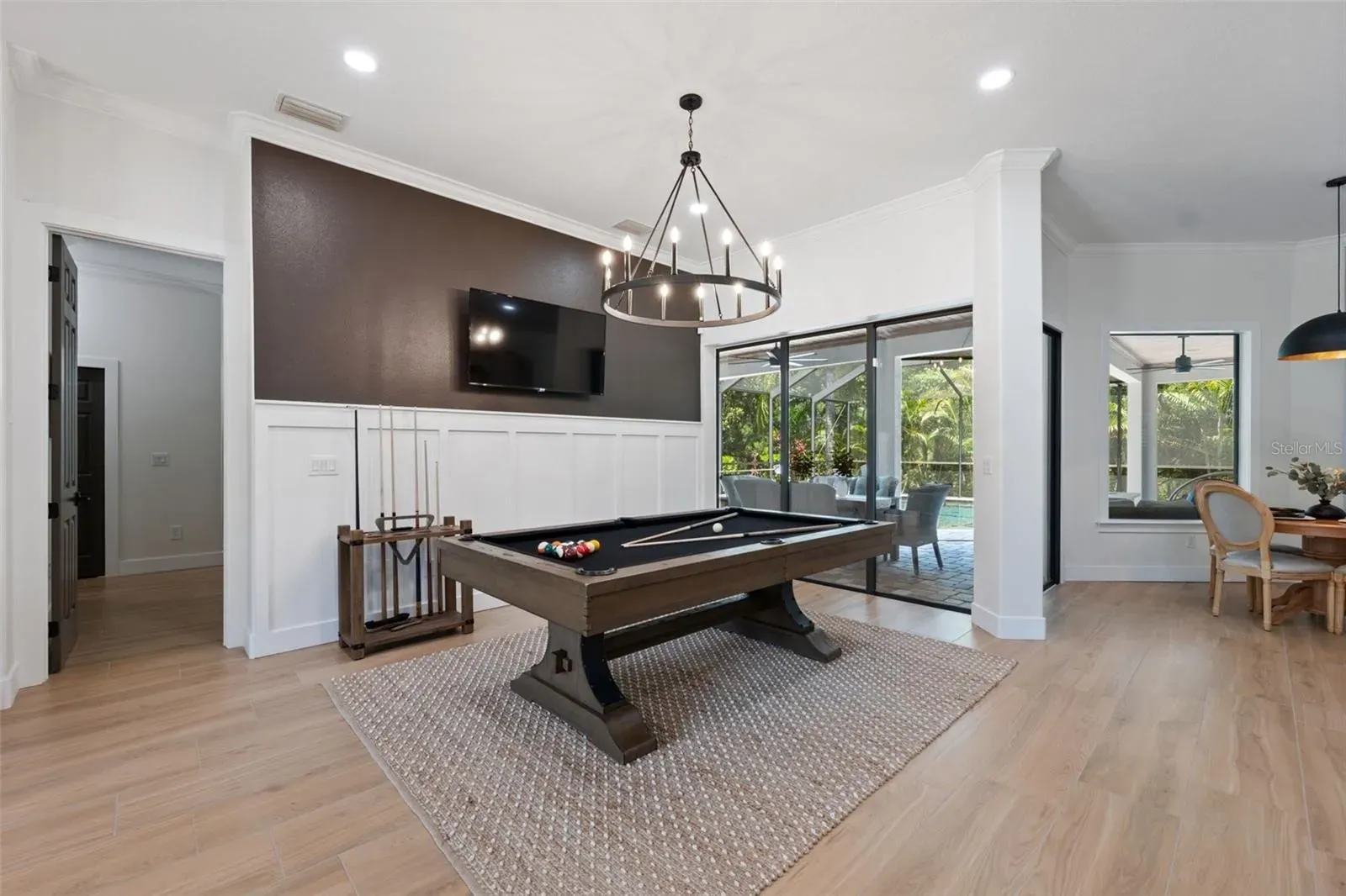 Wood-look tile game room open plan Holiday FL