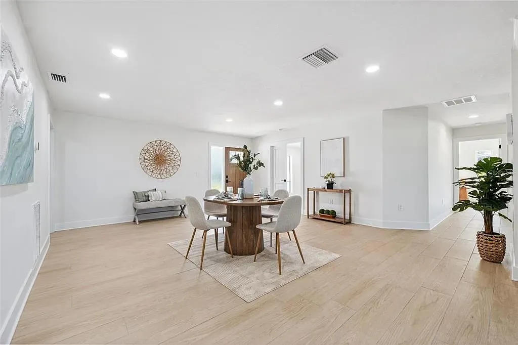 Wood-look tile open dining room Holiday FL